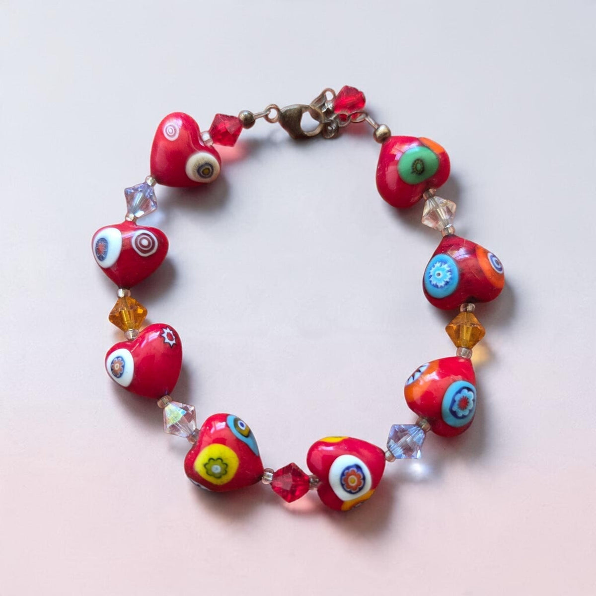 Blanca Closet red millefiori heart bead bracelet with crystal spacers and a secure metal clasp