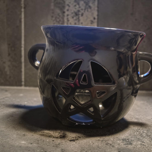 Blanca Closet black ceramic cauldron wax melt warmer featuring a pentagram cutout design for tea light candles.