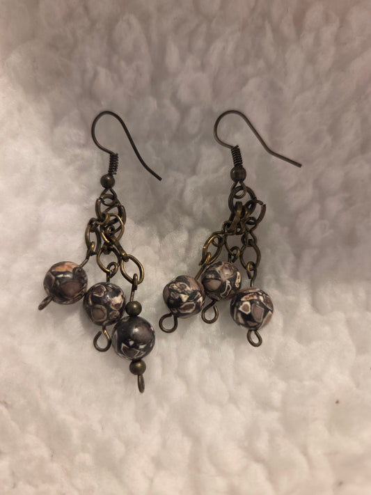 Blanca Closet handcrafted dangle earrings with three patterned beads and antique bronze-tone metal chains