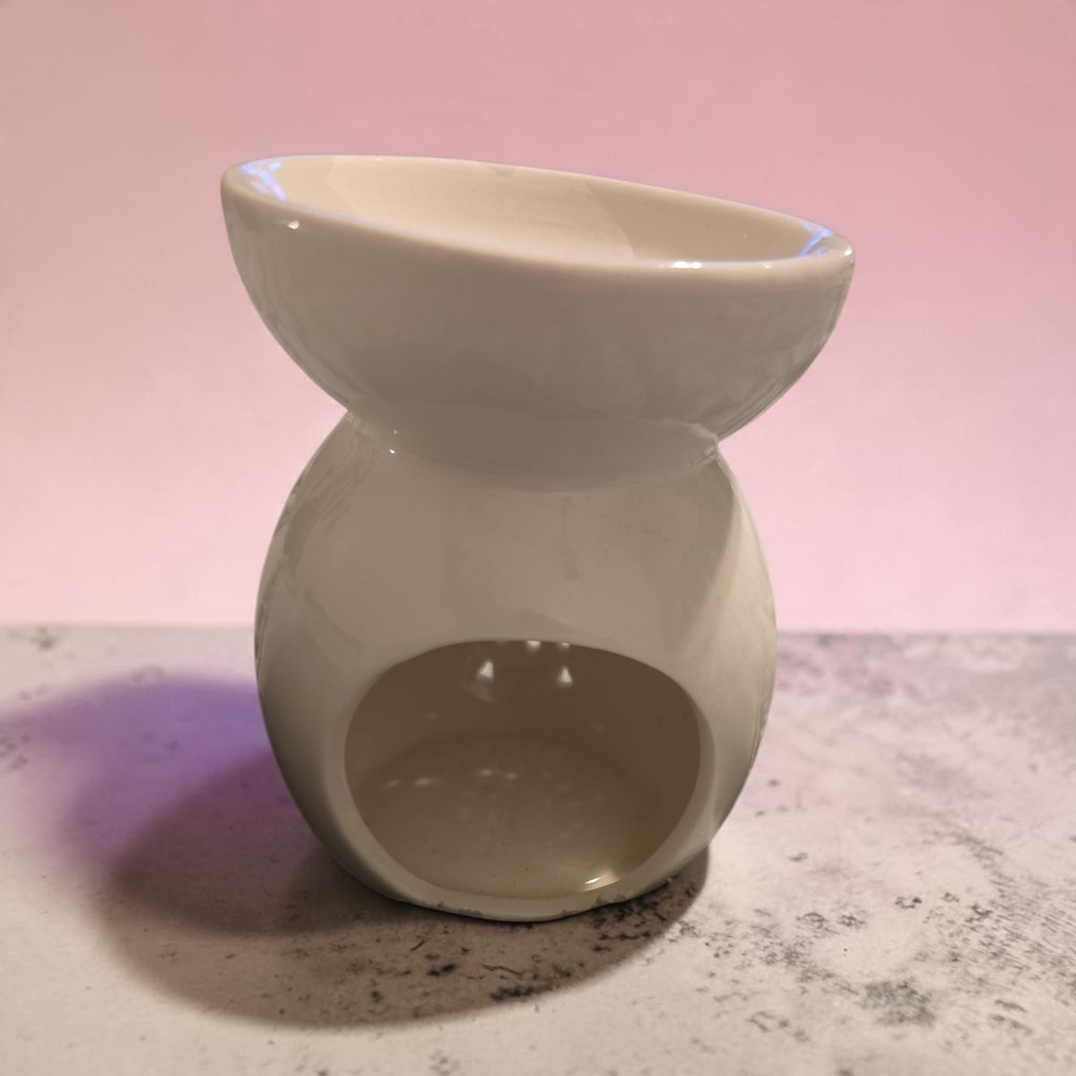Blanca Closet white ceramic wax and oil warmer with a minimalist design for home fragrance and aromatherapy