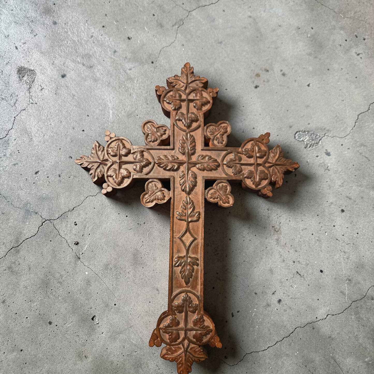 Intricately wood carved cross